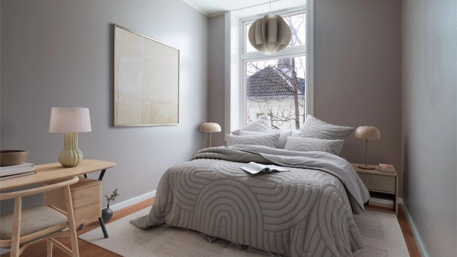 Soverommet plass til dobbeltseng av ønsket størrelse, nattbord og garderobeskap. Bildet viser en illustrert innredning.