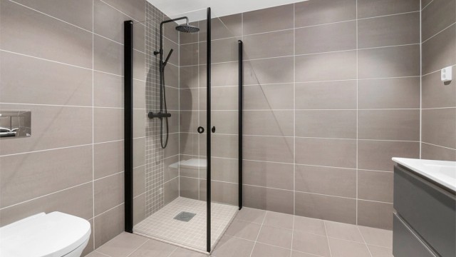 Dusjhjørne med innfellbare vegger.