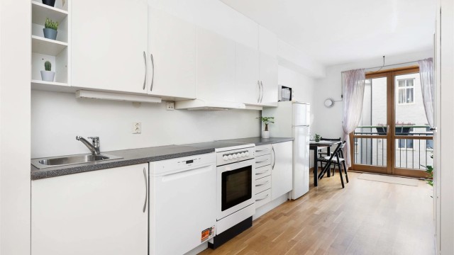 Arealeffektiv studioleilighet med åpen planløsning og parkett på gulv.
Foto: Mats Lie