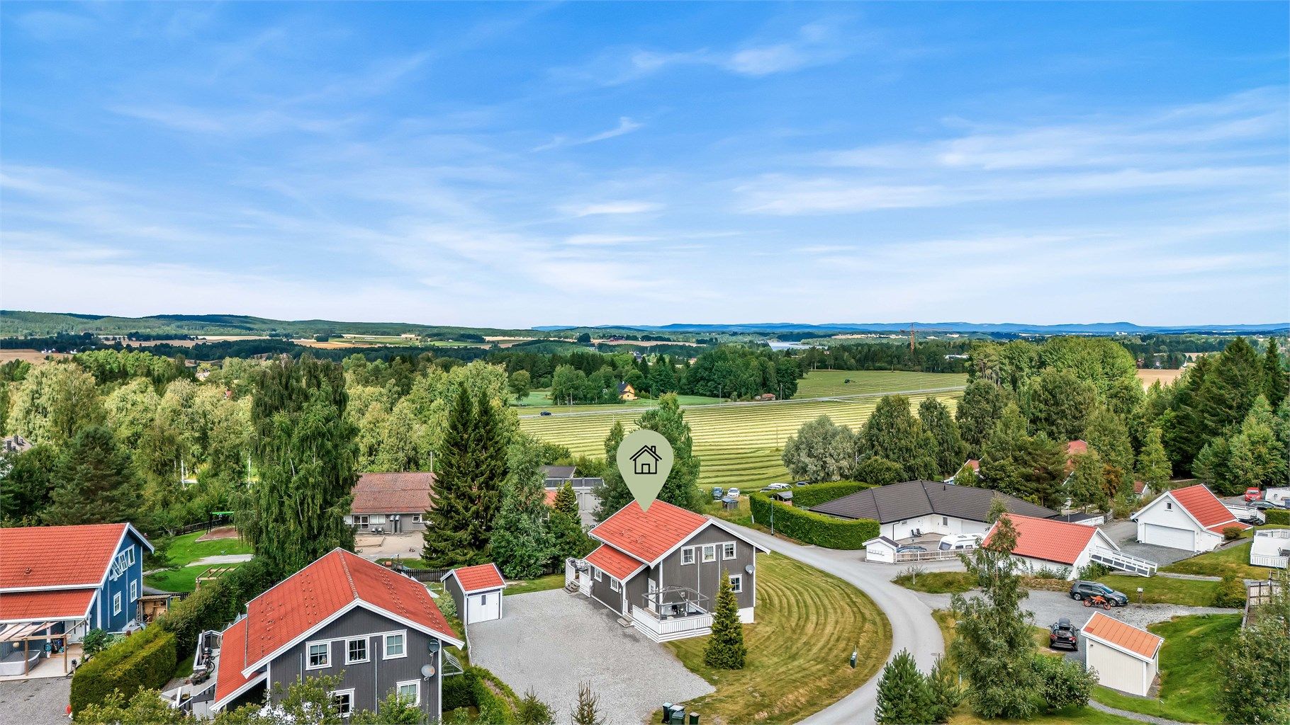 Halvpart av tomannsbolig med romslig tomt på Auli. 