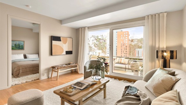 Leiligheten har overflater holdt i tidløse og delikate nyanser som skaper en behagelig atmosfære. Foto: Fotostallen v/ Lars-Petter Skillestad