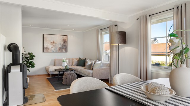 Fin TV-krok i stuen med plass til sofa