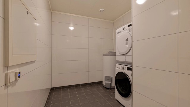 Vaskerommet ligger i boligens underetasje.