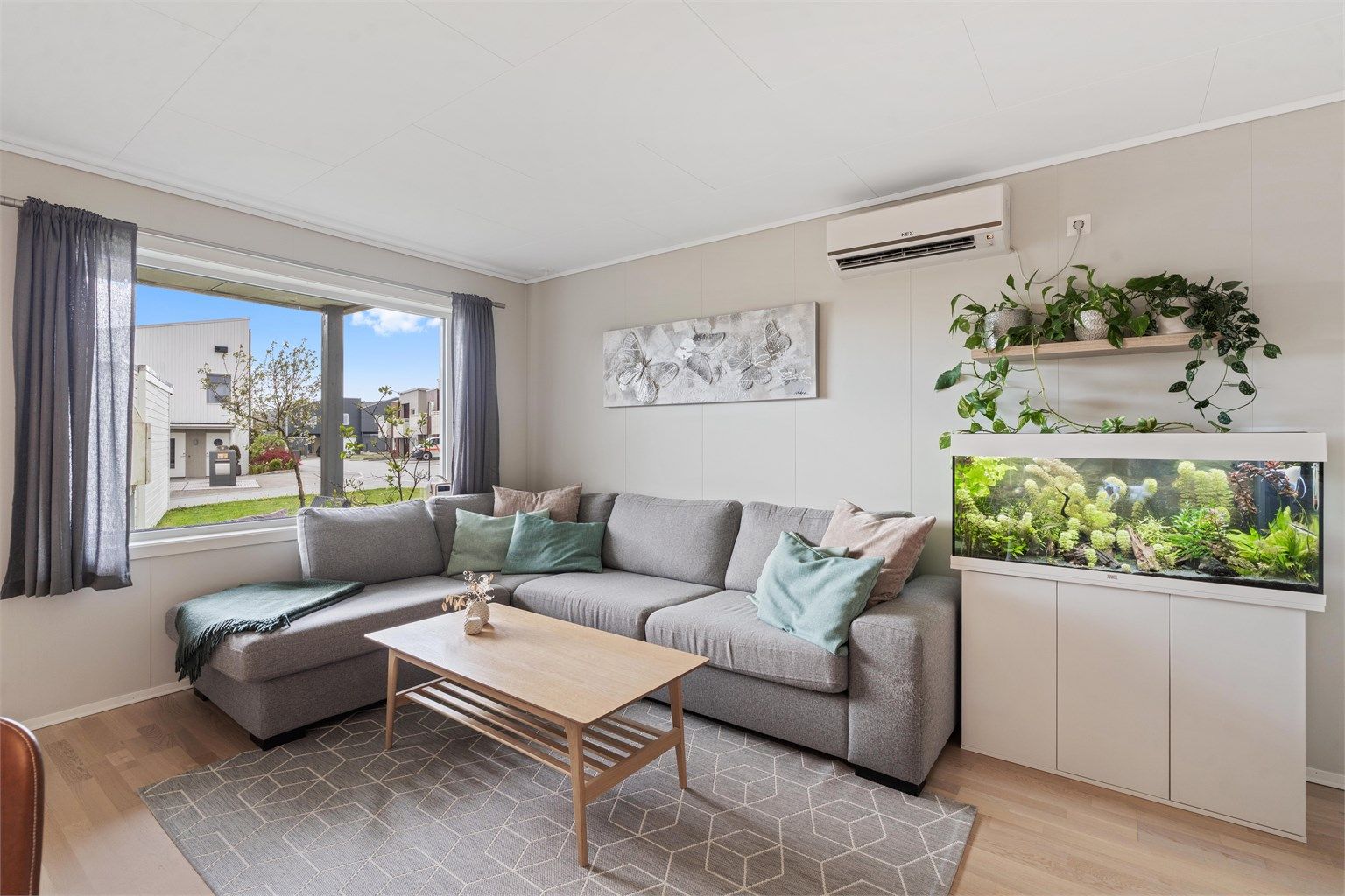 Dette er en arealeffektiv endeleilighet fra 2014 med balansert ventilasjon og varmepumpe.
Foto: Nordbø Foto