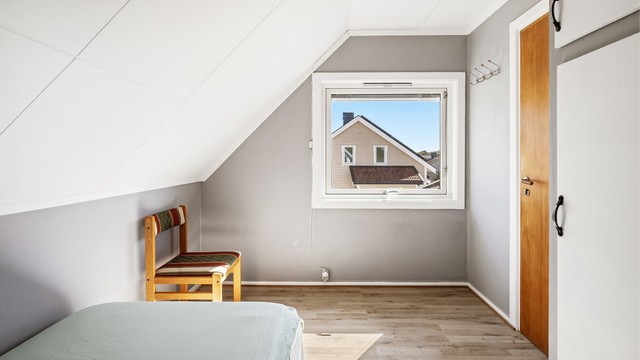 Det andre soverommet på loftet, ideelt som barnerom, gjesterom eller kontor.