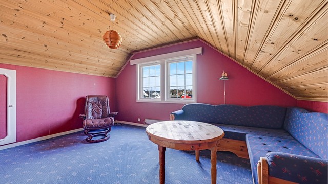 I gangen i andre etasje er det plass til en liten loftstue.