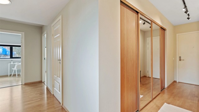 Gangen binder sammen soverommene og badet med resten av leiligheten.