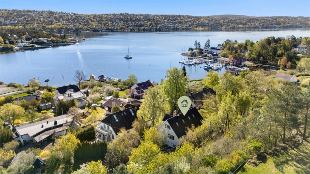 Velkommen til Malmøyveien 4 - Stor og innholdsrik enebolig med fjordutsikt og dobbelgarasje
