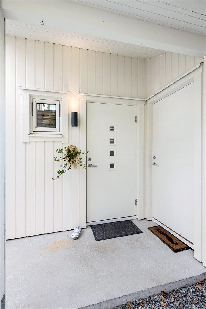 Overbygget inngangsparti med tilknyttet utvendig bod på 3 m².