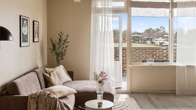 Leiligheten er oppmalt i en lun og moderne fargepalett