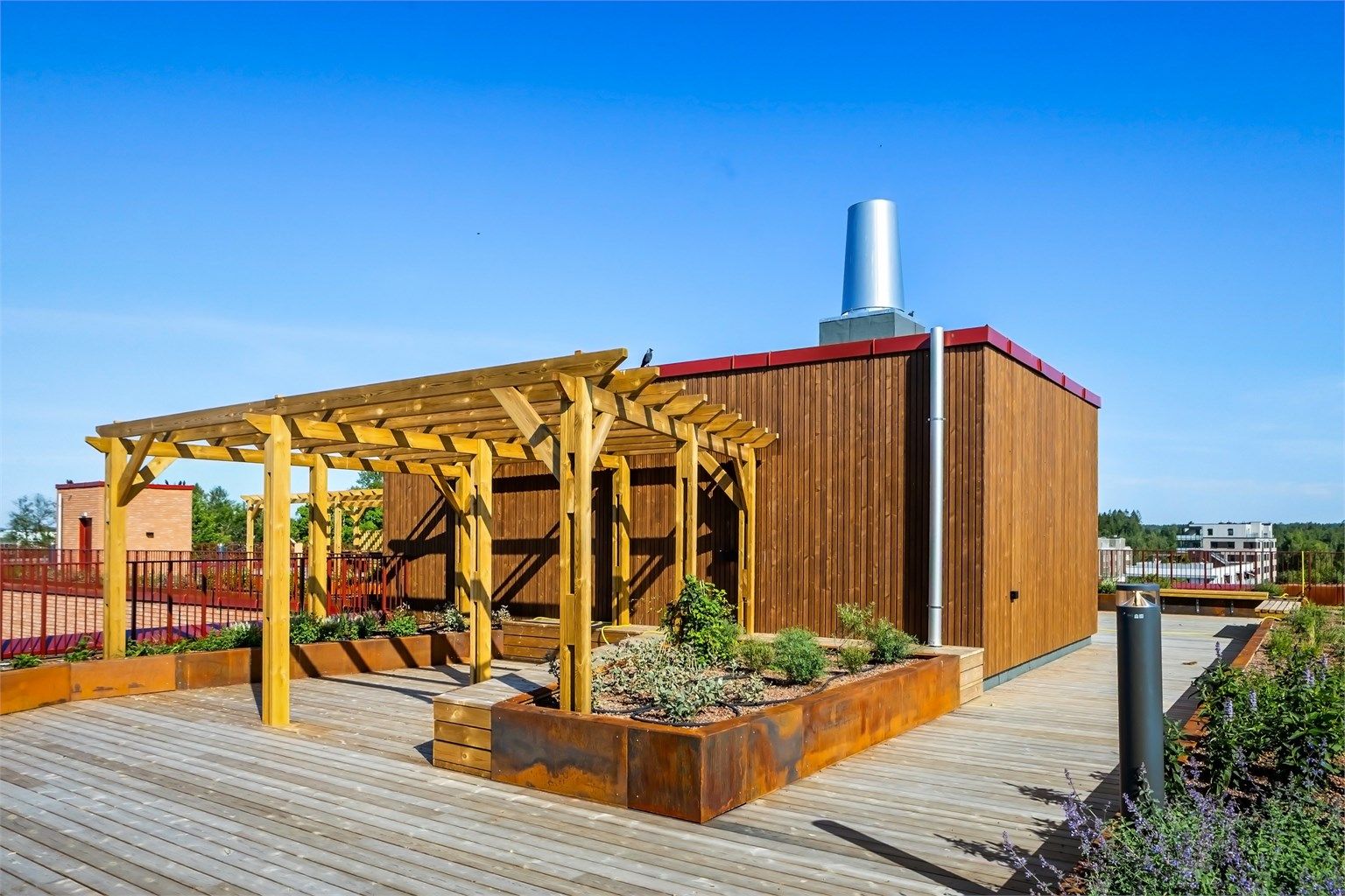 Flott felles takterrasse hvor lange sommerkvelder kan nytes