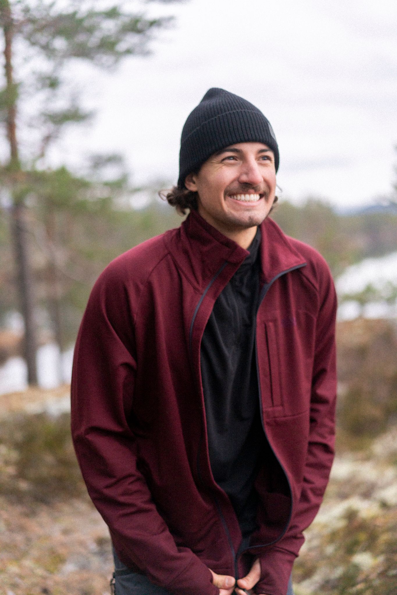 Man in red wool fleece jacket.