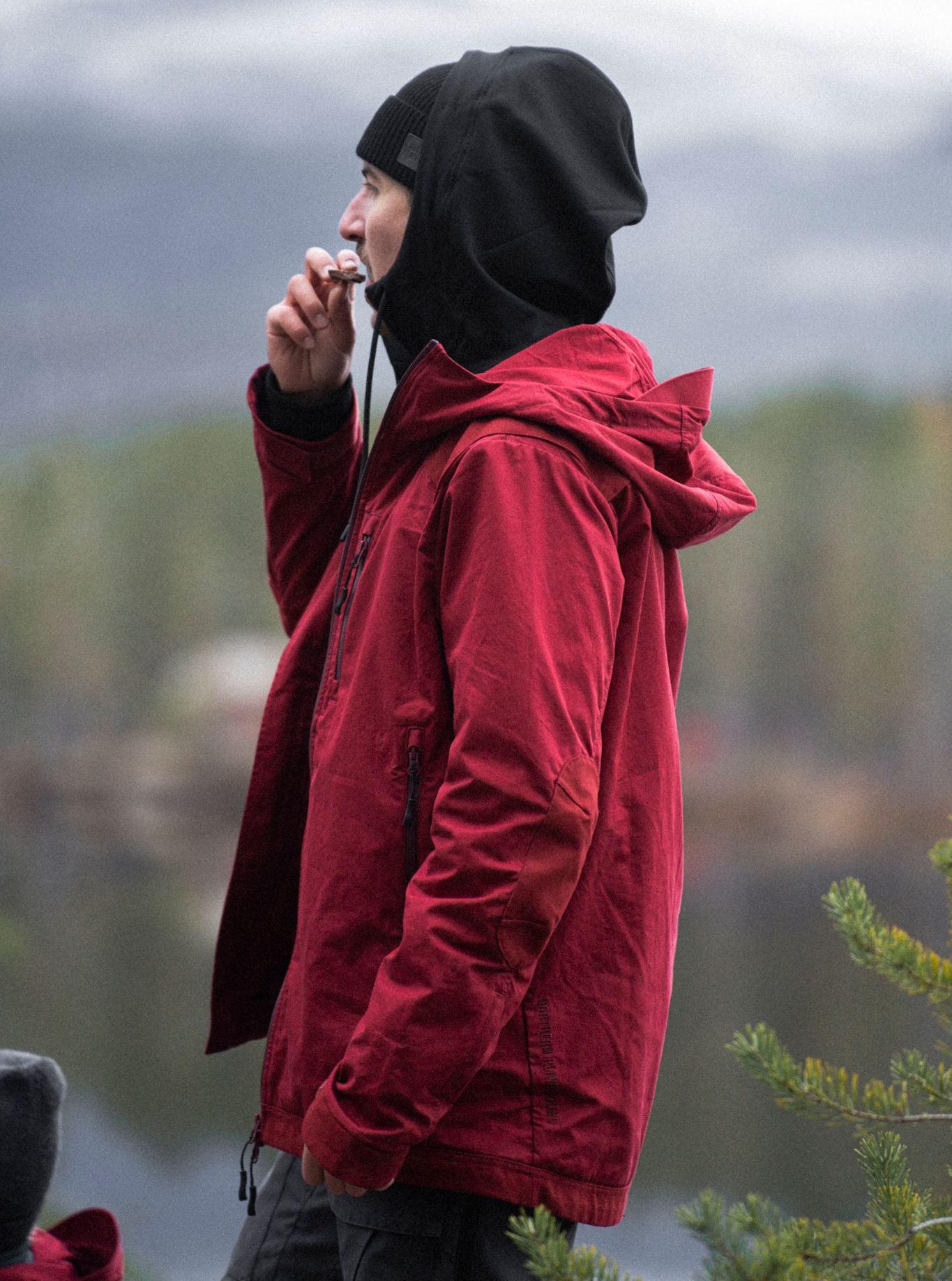 Man in The Last Jacket eating a chocolate bar