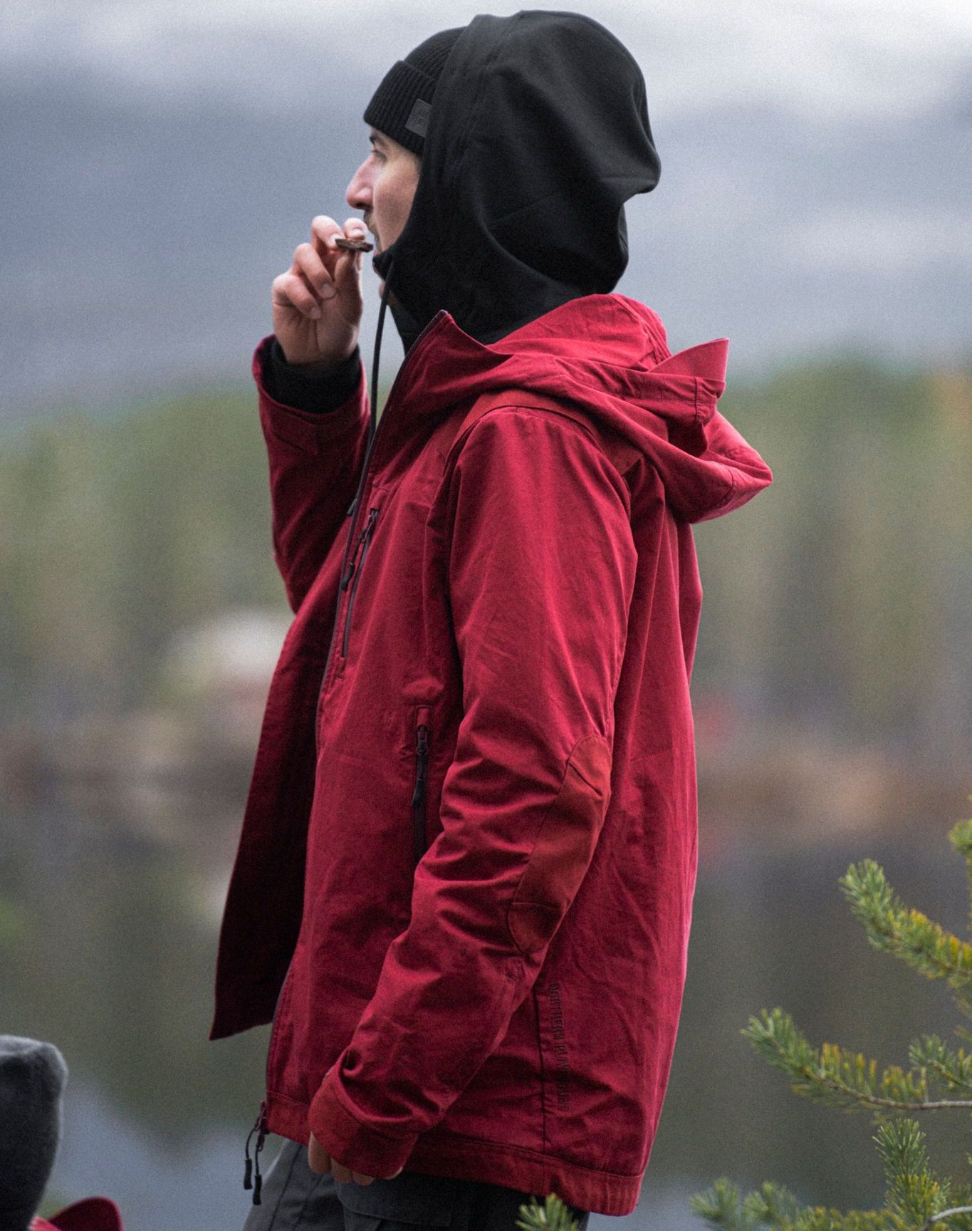 man in red The Last jacket eating chocolate