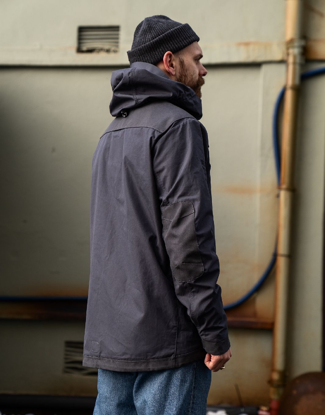 Man wearing the grey The Last Jacket