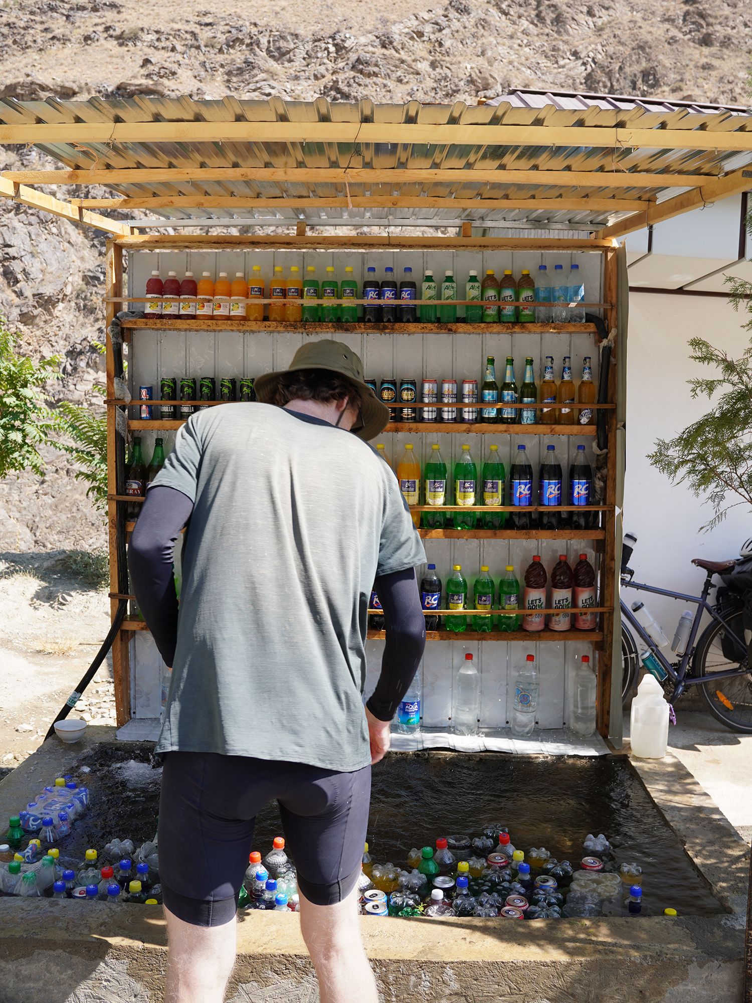 Man choosing a refreshment from the pool