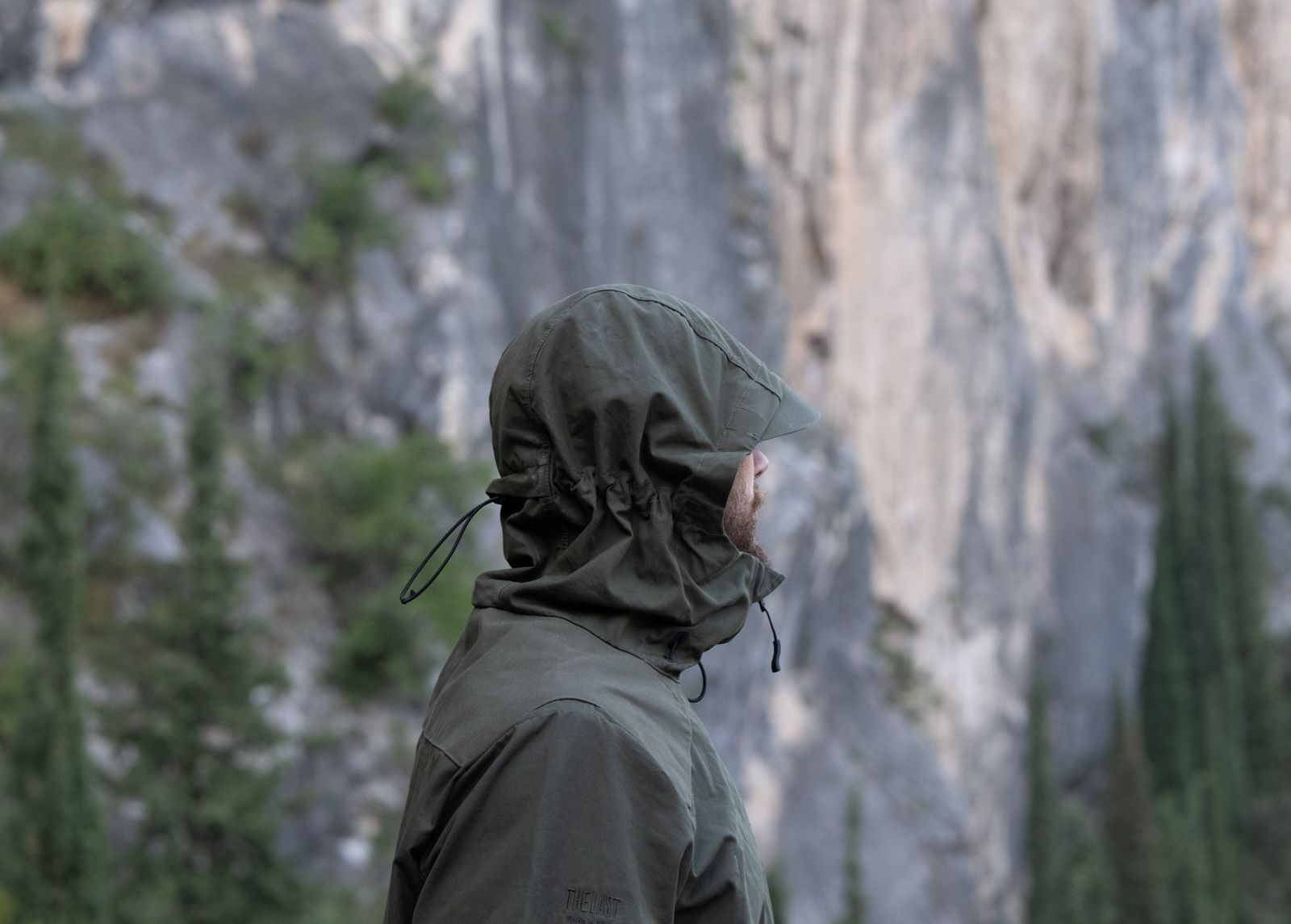 man looking at the horizon in The Last Jacket