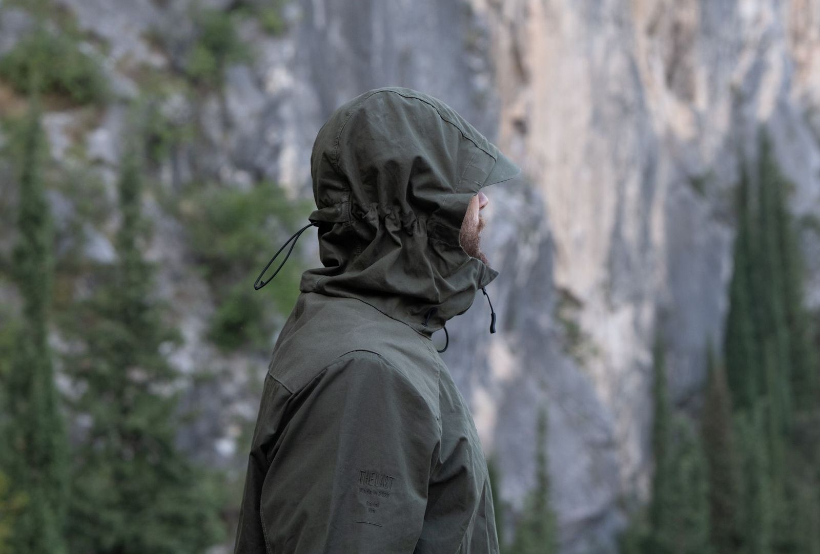 man watching the horizon in The Last Jacket