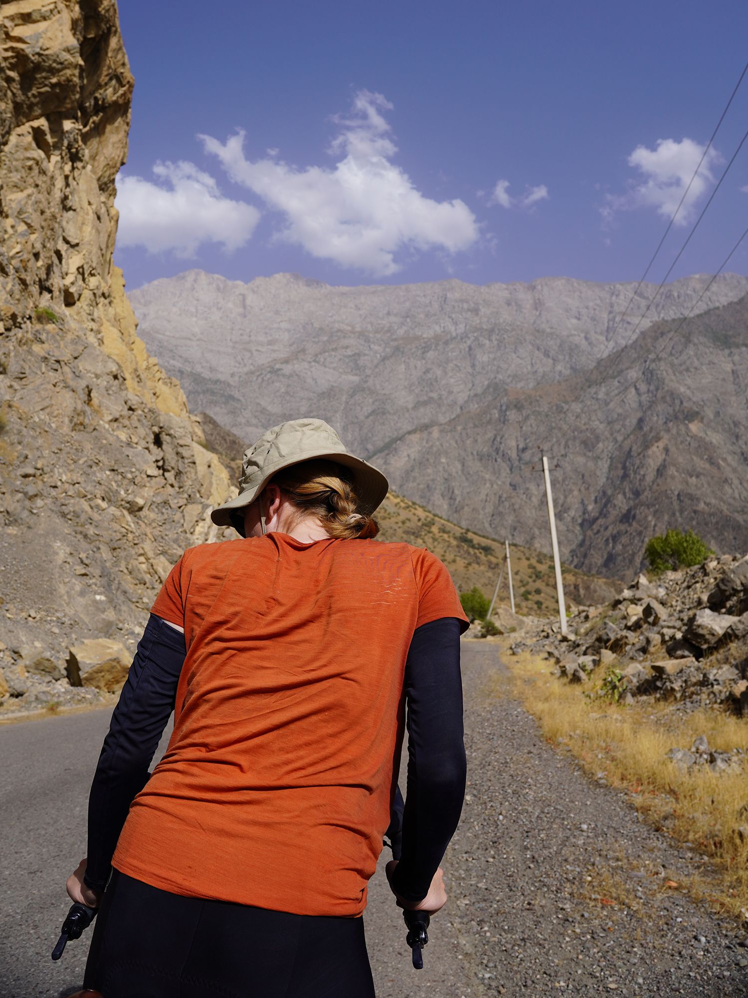 Bike riding on remote roads in wild landscapes