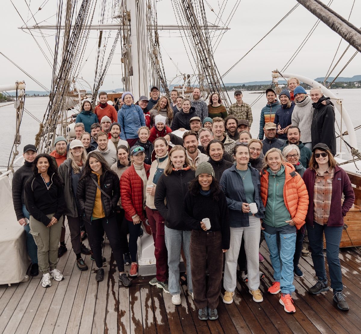 A group of people on board a sailboat