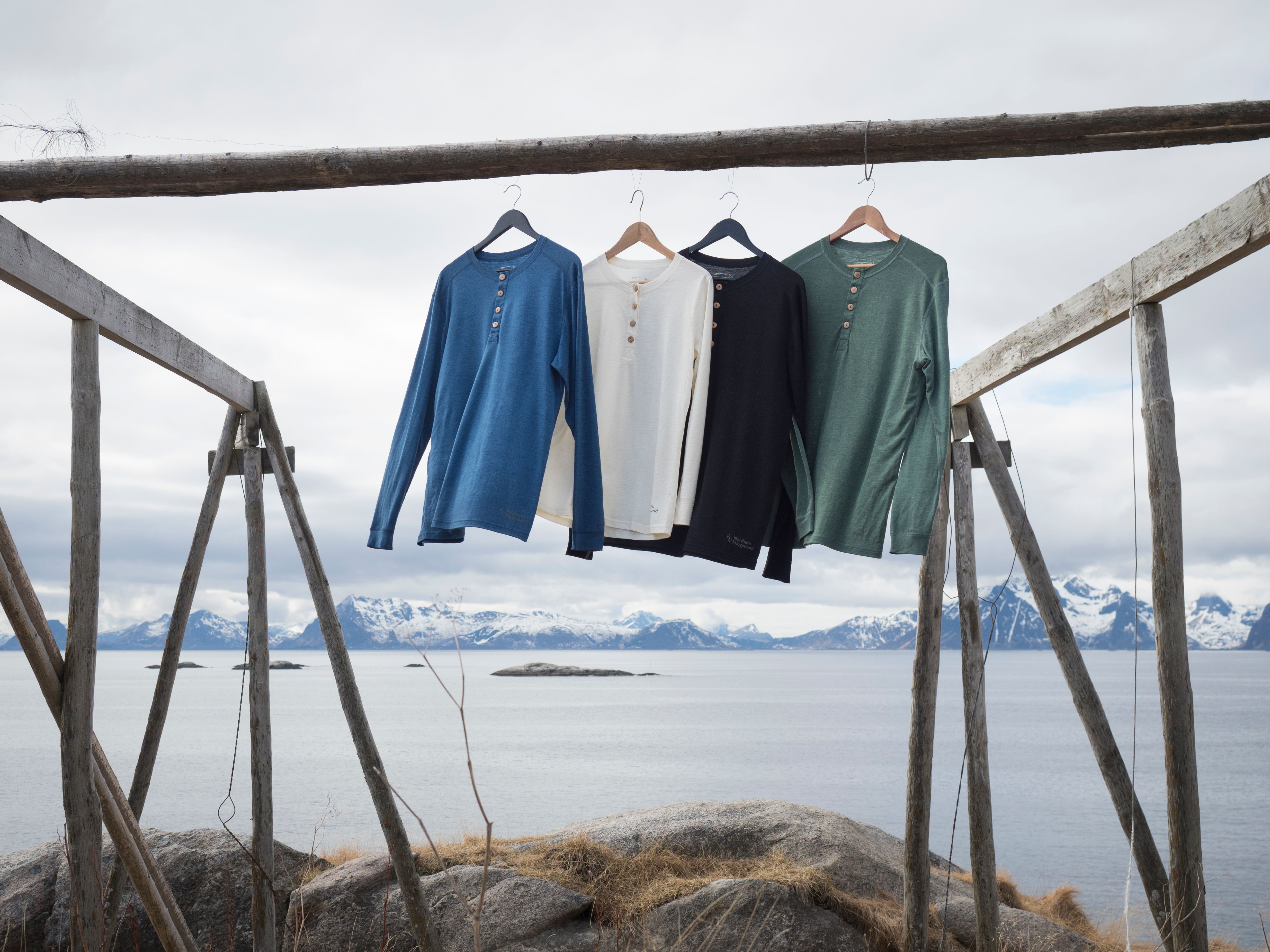 Henley shirts outside with mountains in background