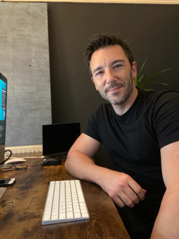 Fractional CMO reviewing marketing performance with a business owner
