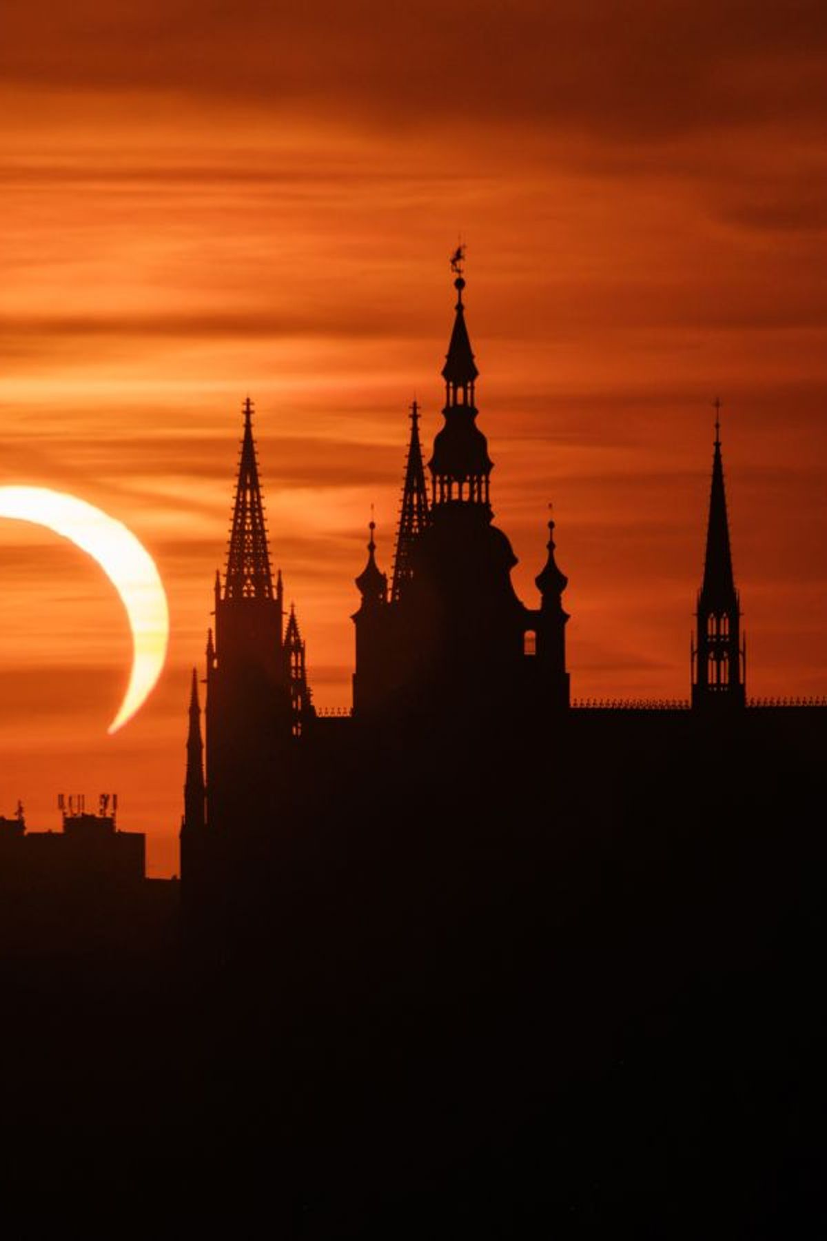 Partial Eclipse from behind the St. Vitus Cathedral, Prague, Czechia