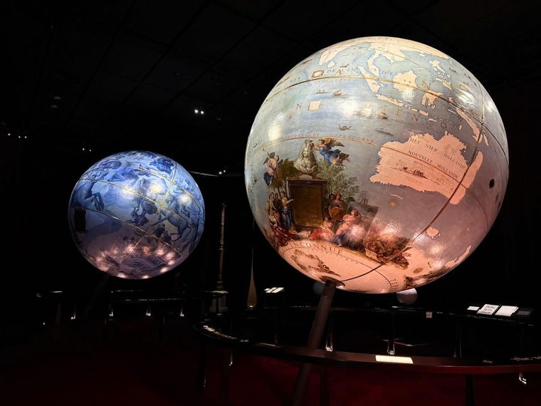 From left to right: the celestial and terrestrial globes created by Coronelli for the Sun King