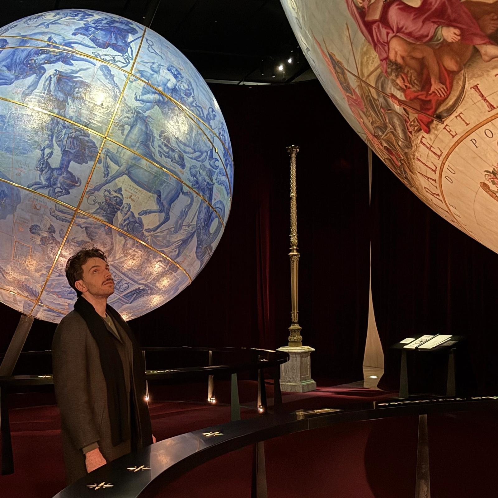Leonardo Frigo observing the Sun King's globes