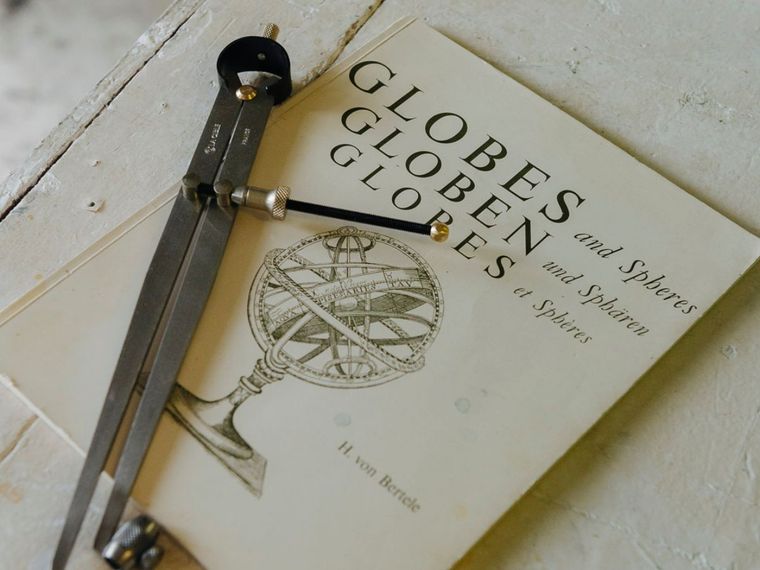 Compass and "Globes and Spheres" by H. von Bertele