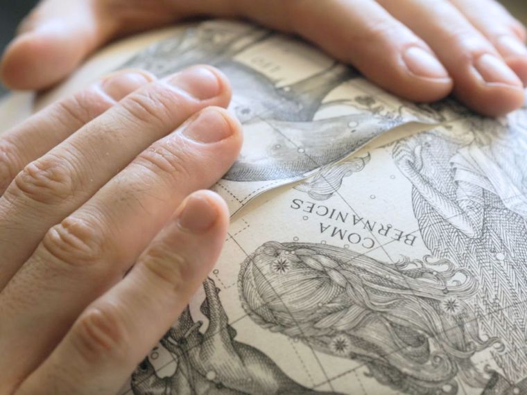Applying the illustrations to one of my globes as part of the cartography process