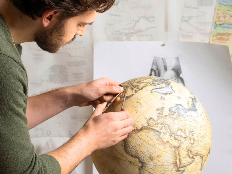 Leonardo Frigo working on the custom-made globe for Asprey London