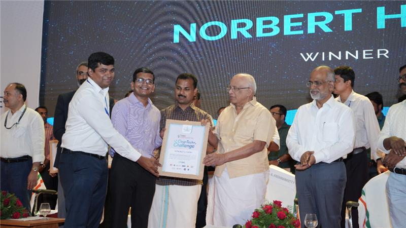 SolYield team receiving award from Minister for Electricity of Kerala, India
