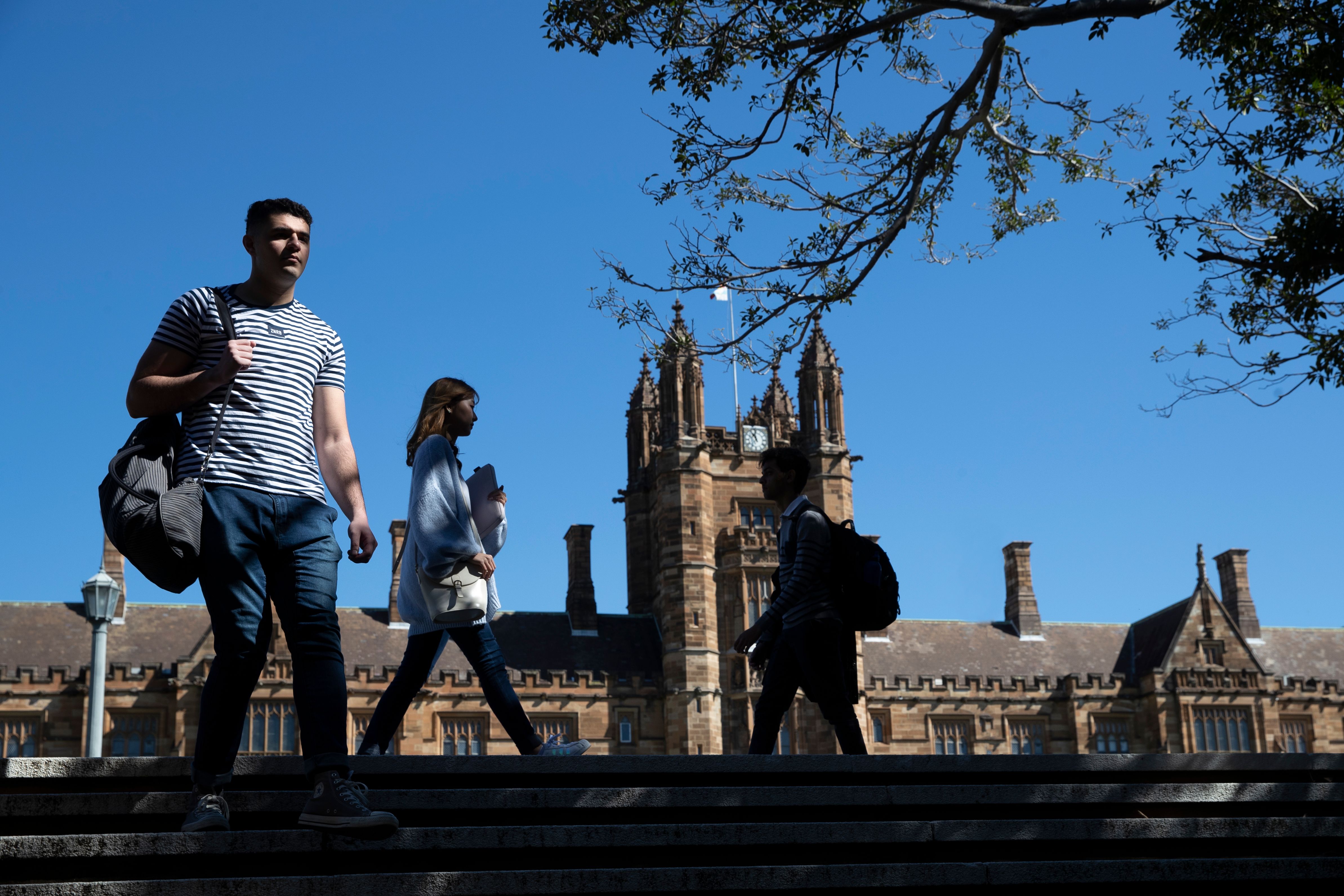 Students walking on campus at the University of Sydney.