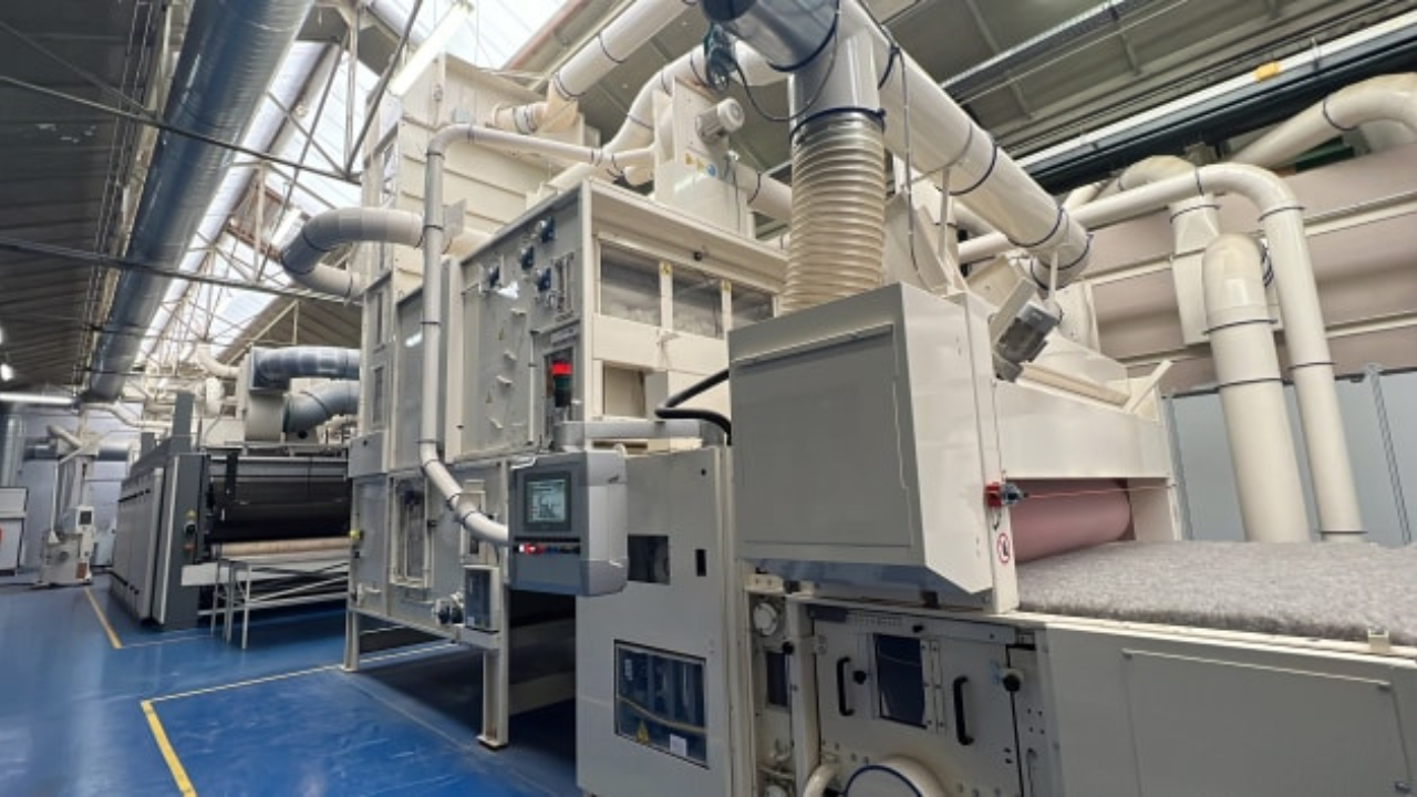 Packaging machine making wool based insulation