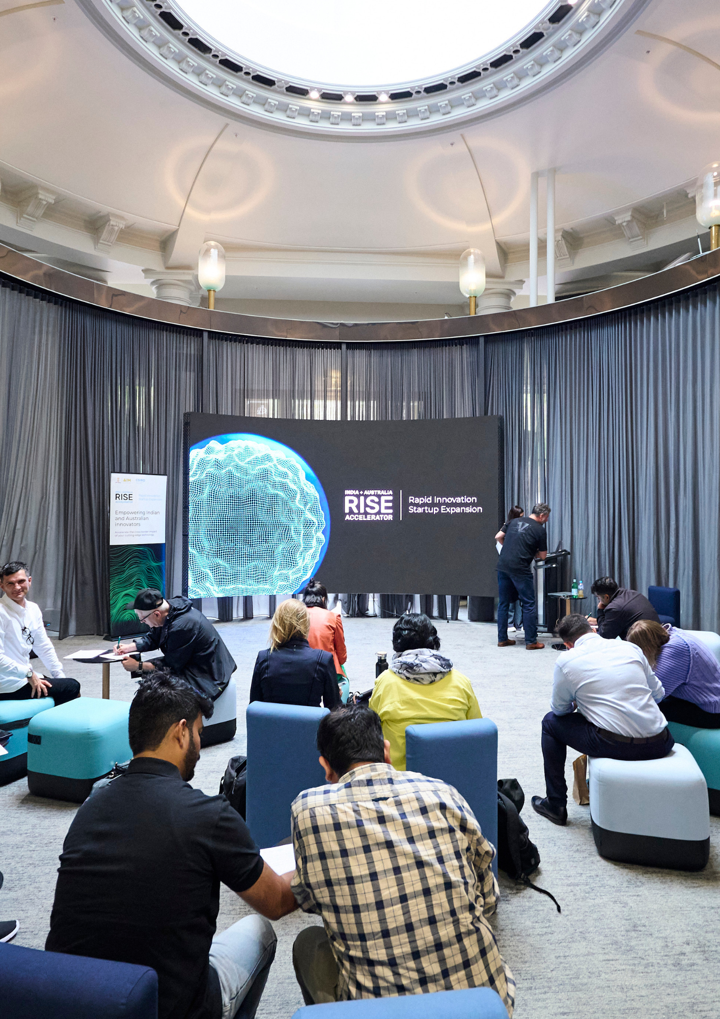 Presentation screen at a RISE Accelerator event.