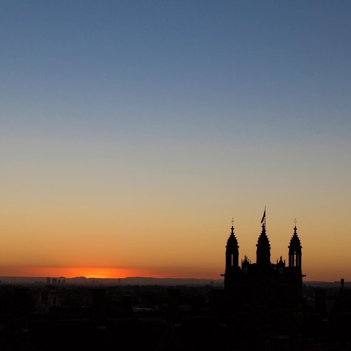Sunset over the University of Sydney skyline.