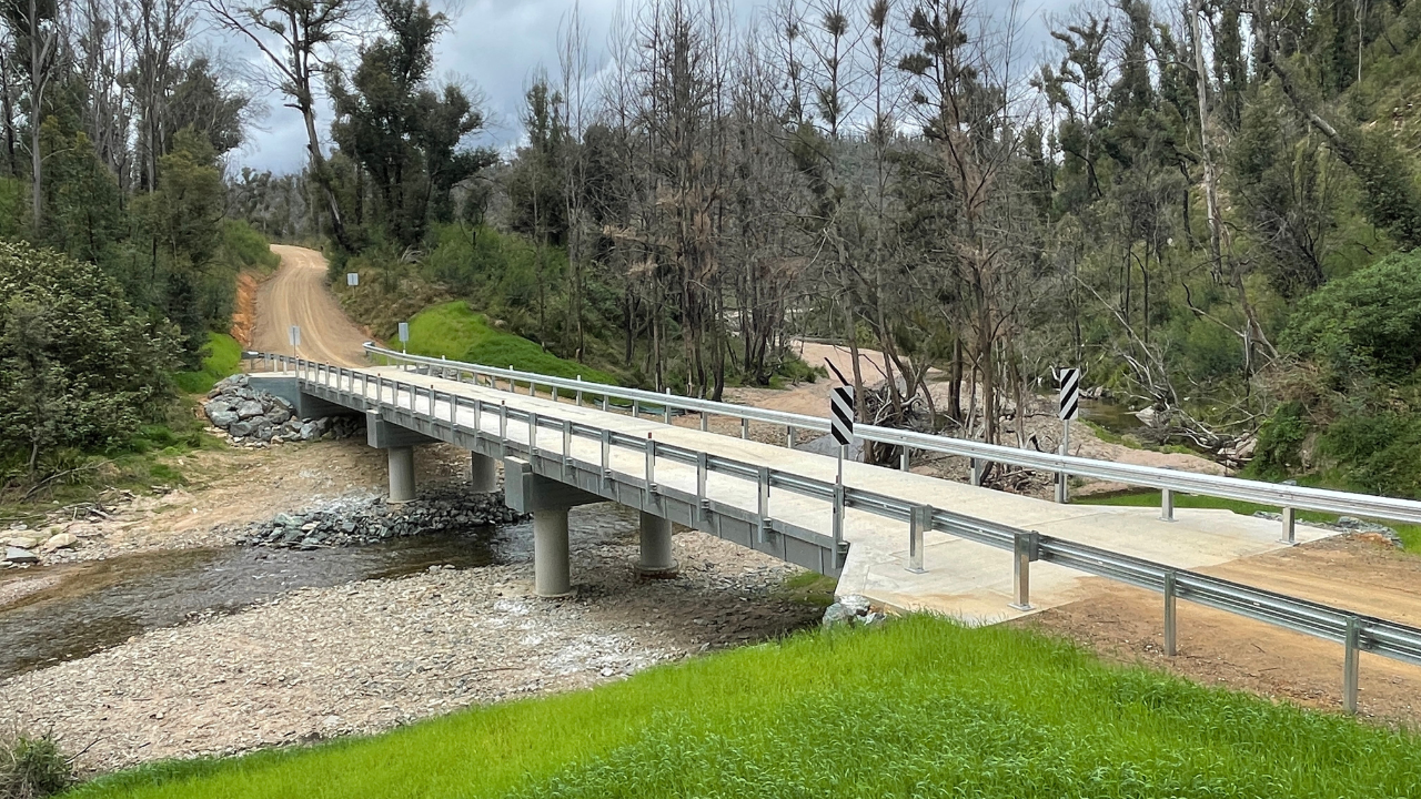 Small Concrete bridge over river bedding