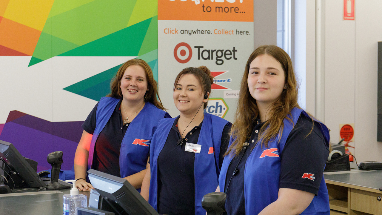 Kmart team members at a store checkout