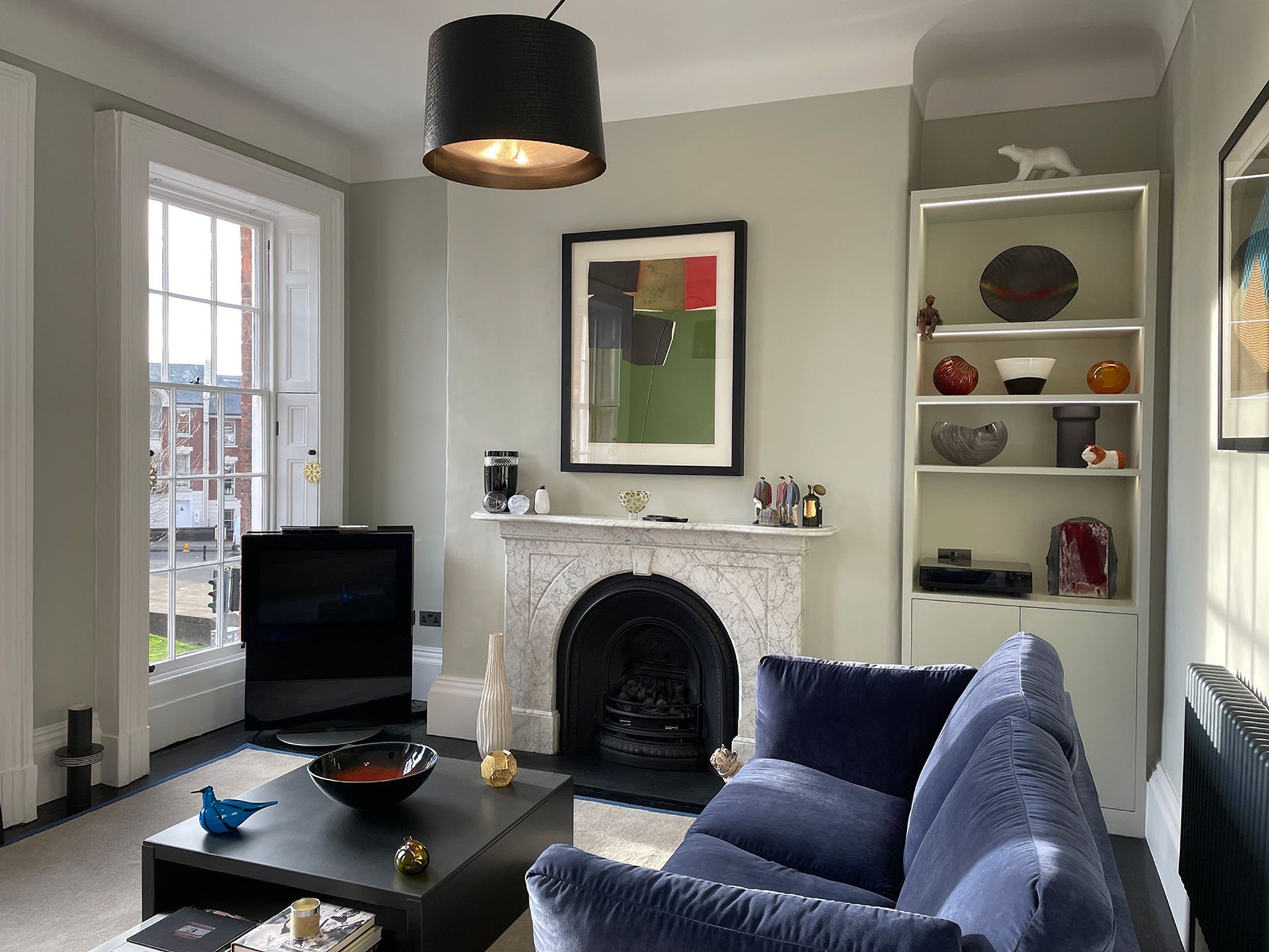 A finished living room with restored period detail.