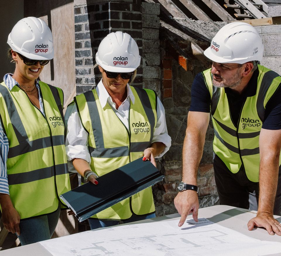The team checking materials on site.