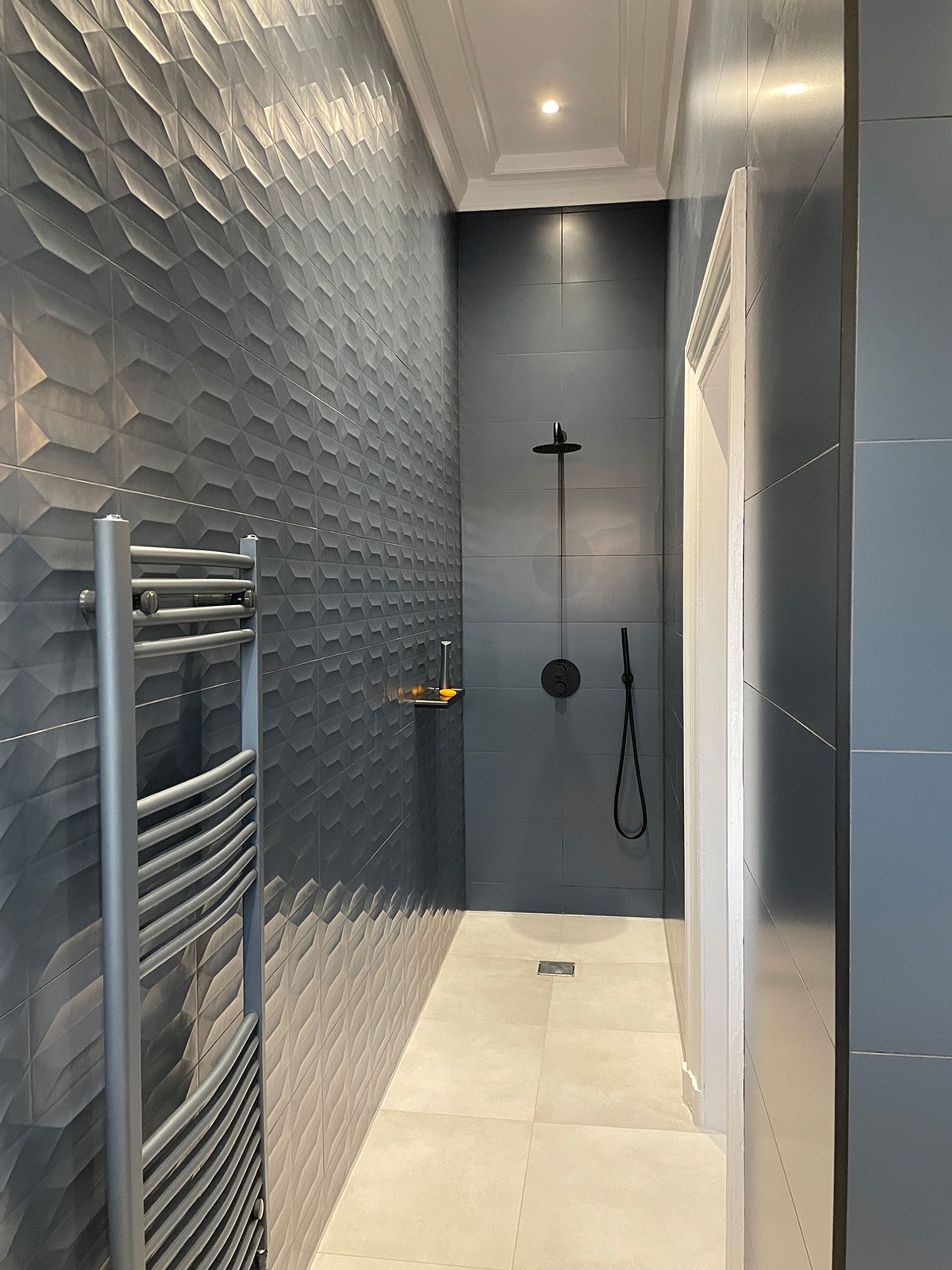 A modern bathroom fitted within the historic building.