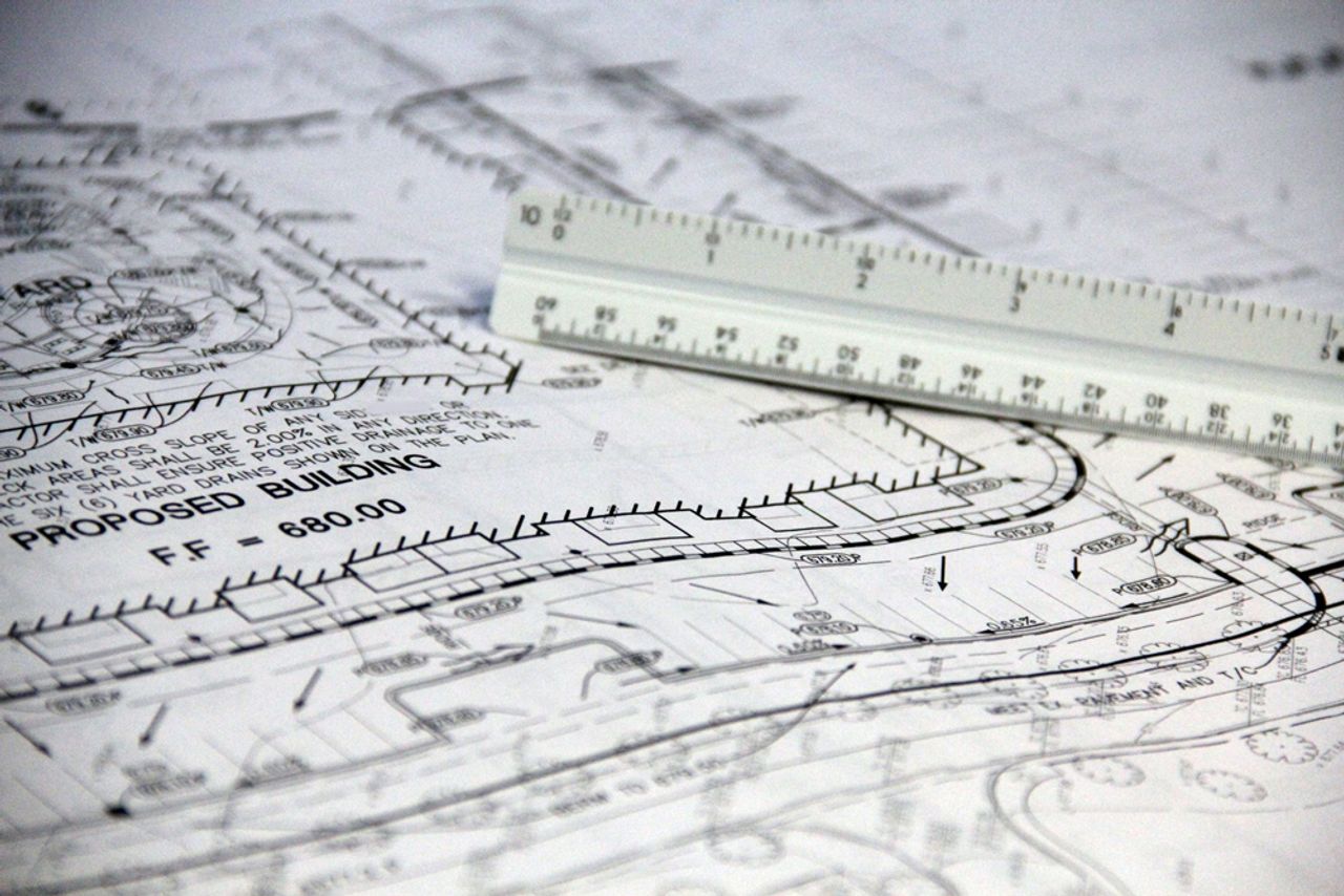 Drawings being reviewed during pre-construction.