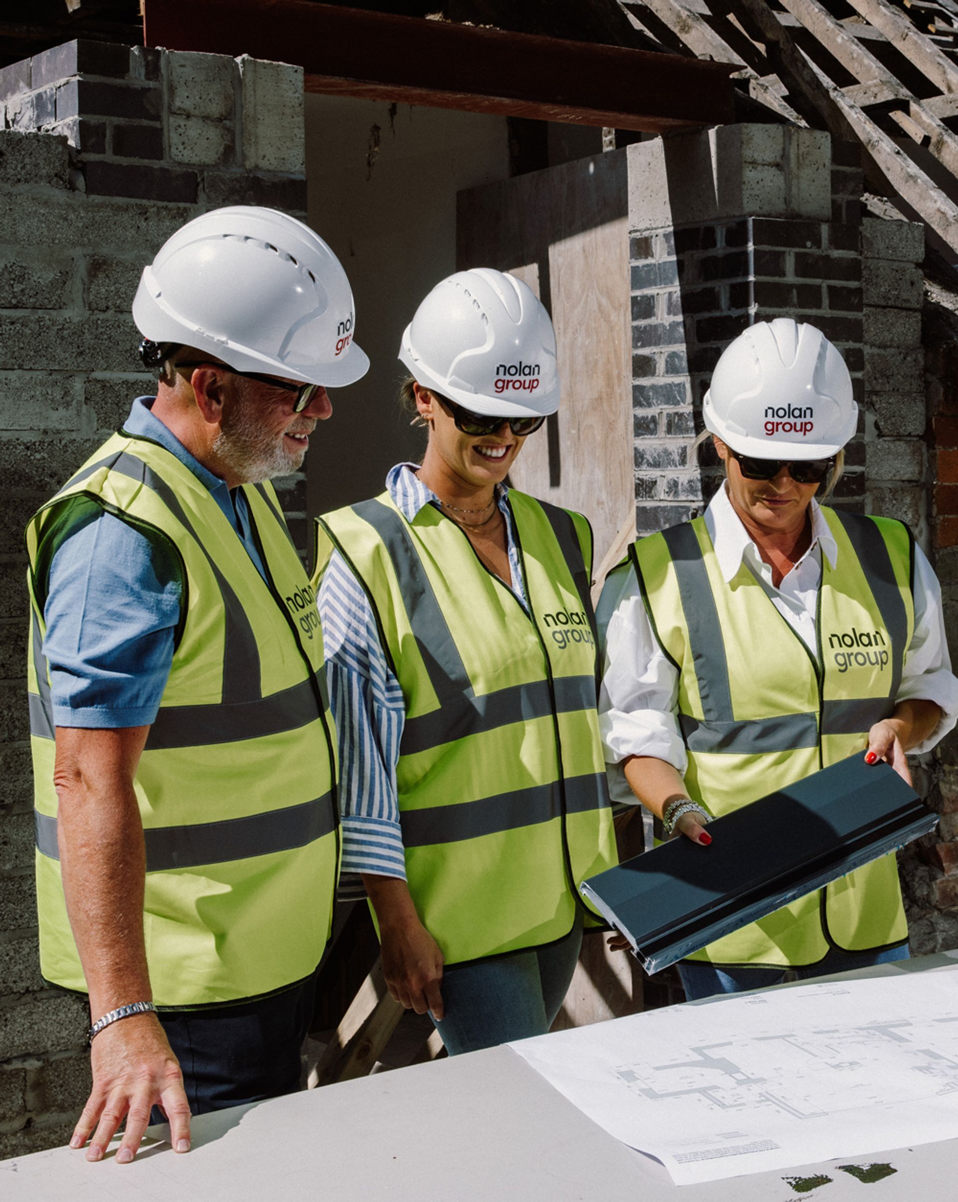 The management team walking a client through the work.