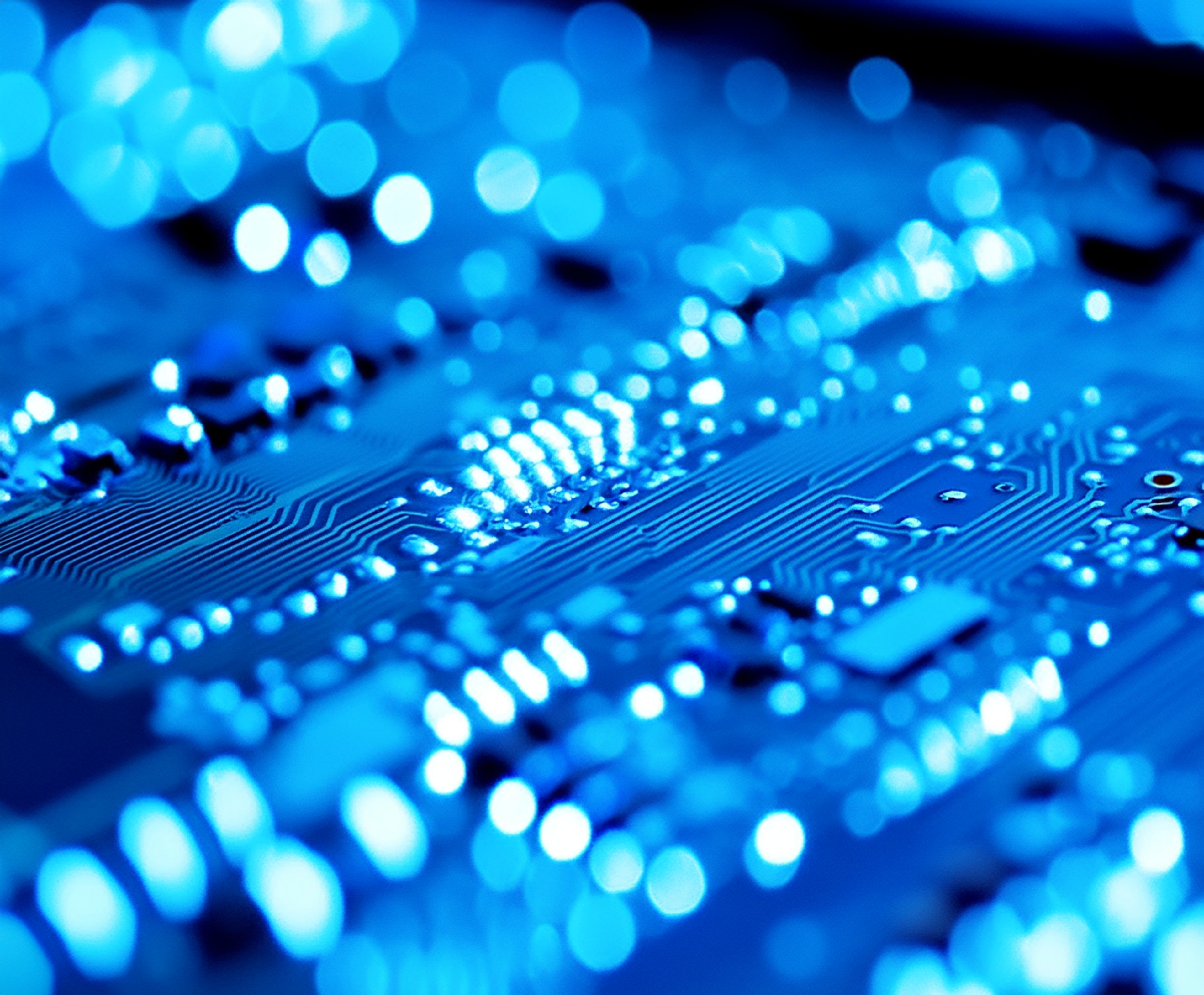 Cover image for the conference abstract "Assessing Healthcare Data Quality in Saudi Arabia: A Step Towards Improvement." The image shows a close-up of an illuminated computer circuit board, representing healthcare data, digital infrastructure, and data quality assessment.