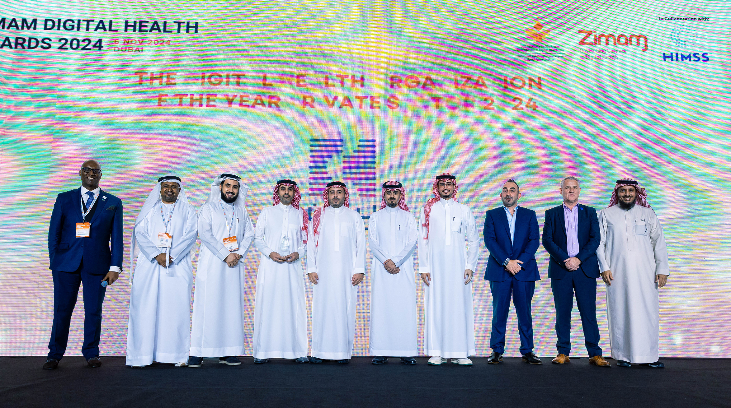 Lean Business Services receiving the Zimam Award 2024 for Best Digital Health Organization of the Year in the private sector.