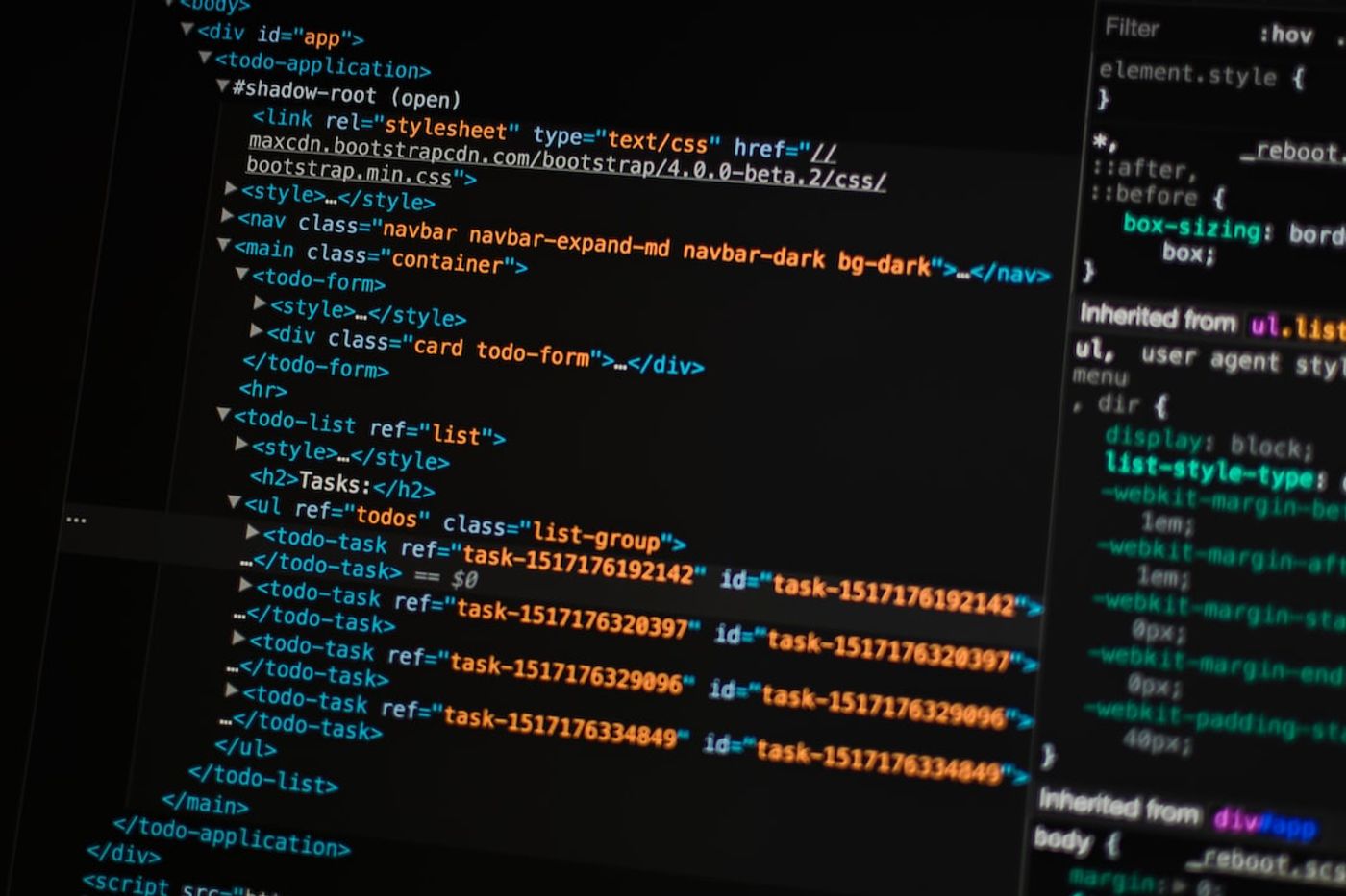 turned on monitor displaying programming language