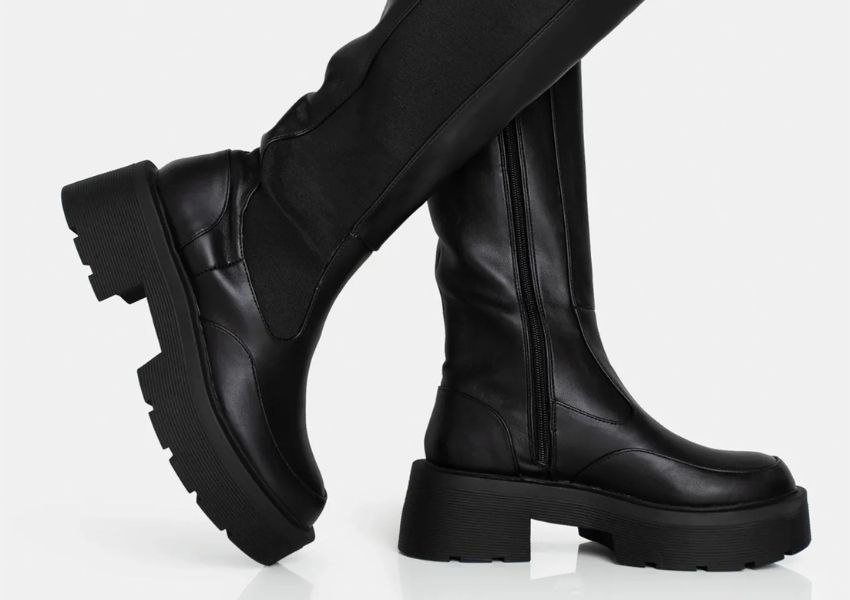 Two black platform boots with chunky soles.