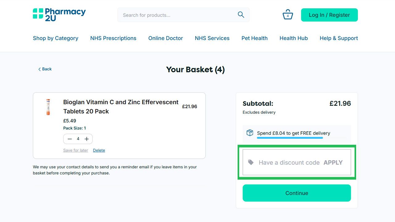 Pharmacy 2U basket page showing Bioglan Vitamin C and Zinc tablets and a highlighted discount code input field.