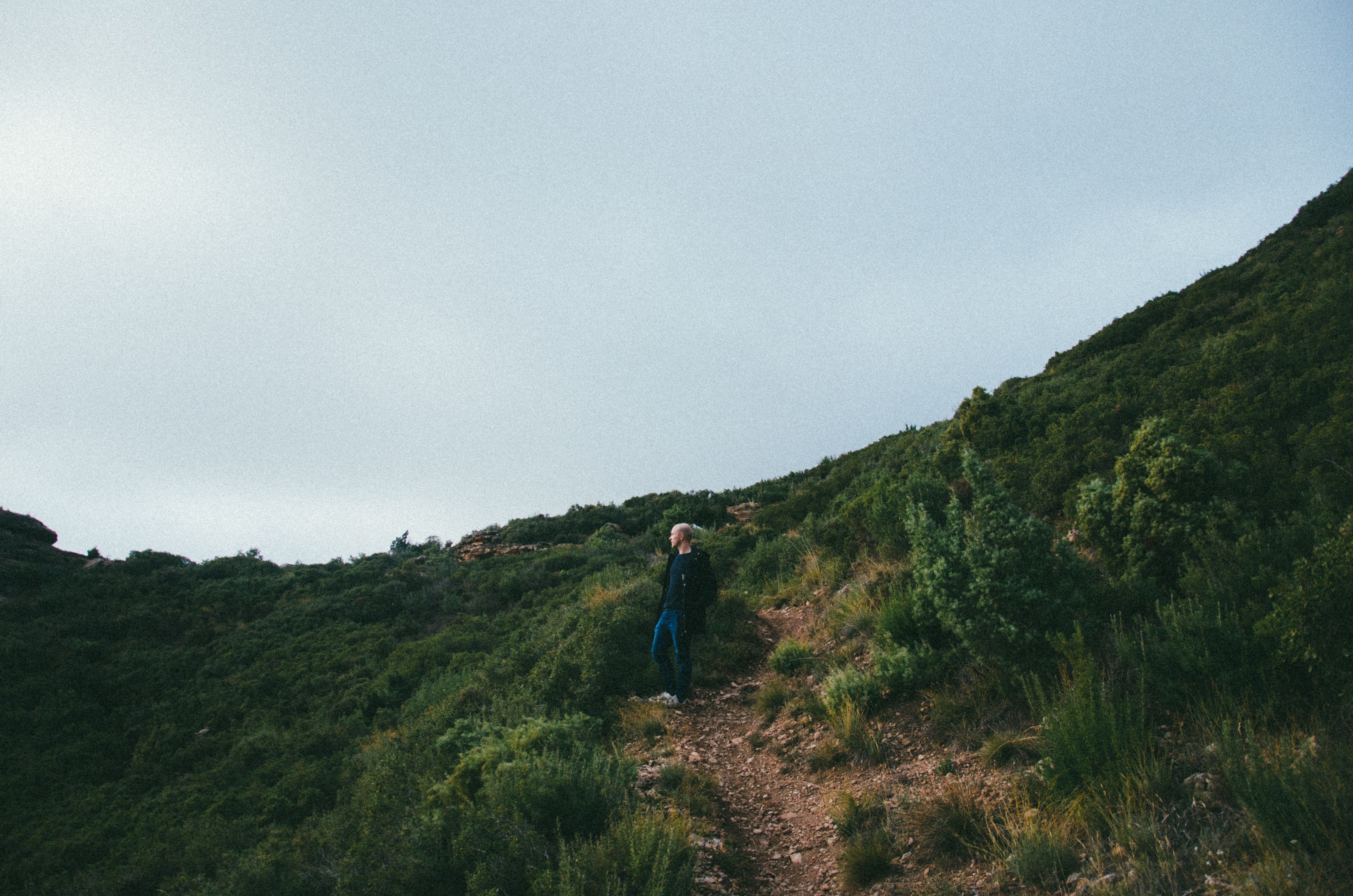 A hiker on a mountain side.
